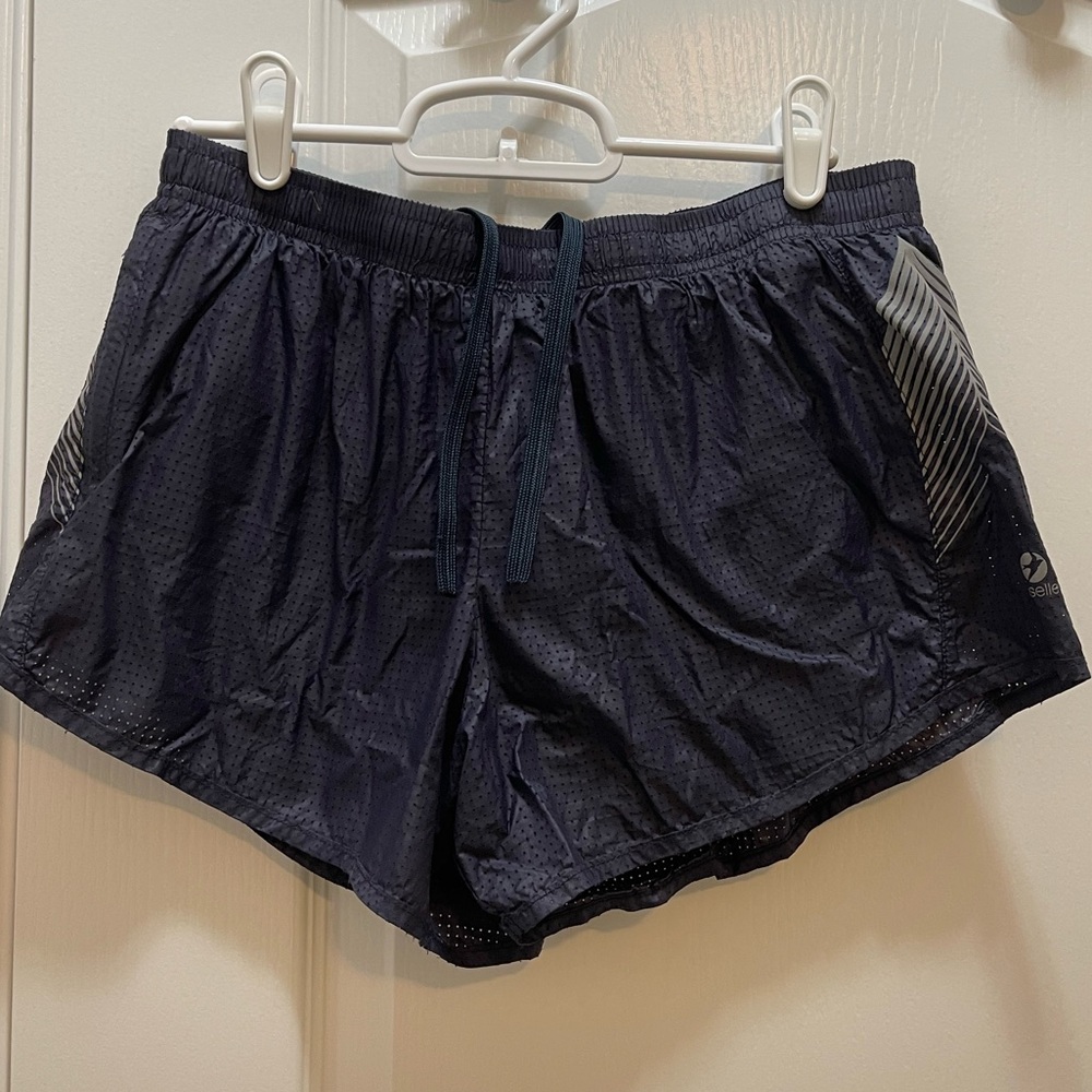Oiselle Navy Holepunch Distance Shorts